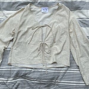 White and beige patterned shirt